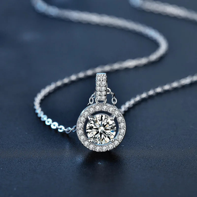 A Stylish and Trendy 925 Silver 1-Carat/2-Carat Moissanite Round Pendant Necklace with a Sophisticated Design.