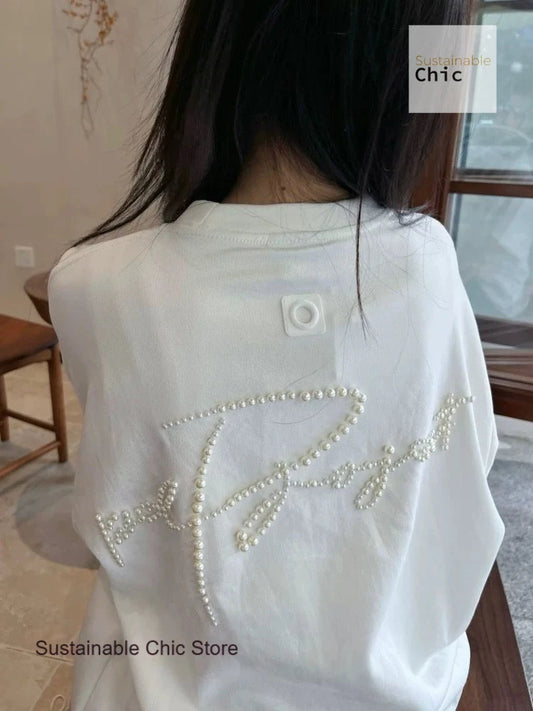 Korean version of fashion stereoscopic Pearl senior loose round neck T-shirt women's summer fashion and leisure niche design top