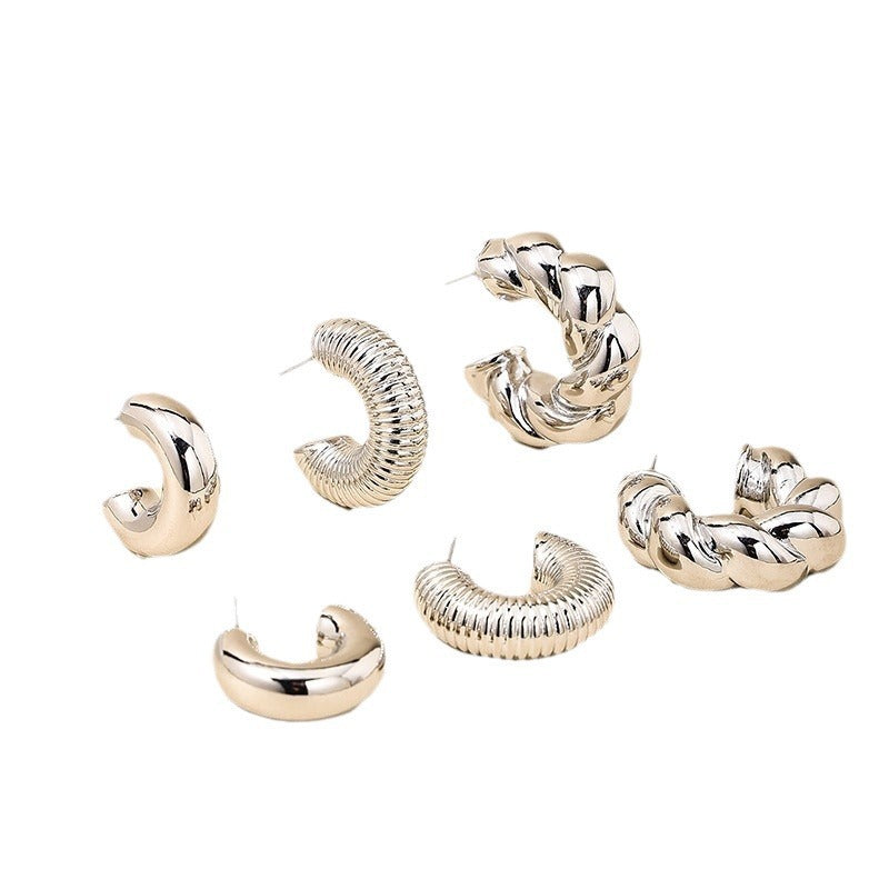 European and American fashion simple twist earrings ladies suit smooth light luxury design sense square face earrings jewelry wholesale