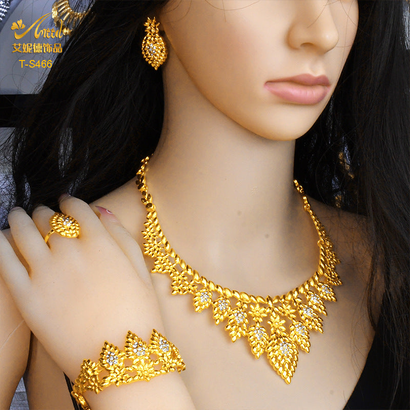 Cross-border hot selling four-piece Indian Dubai gold jewelry necklace bracelet ring earrings bridal wedding big jewelry