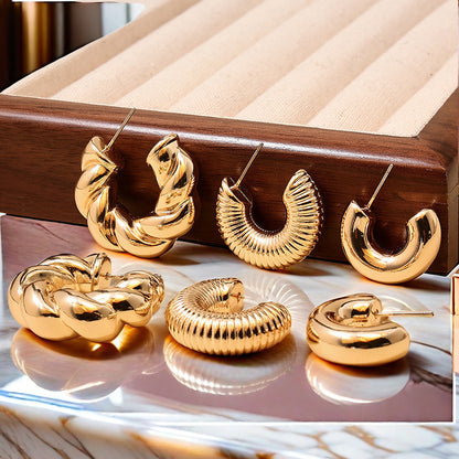 European and American fashion simple twist earrings ladies suit smooth light luxury design sense square face earrings jewelry wholesale