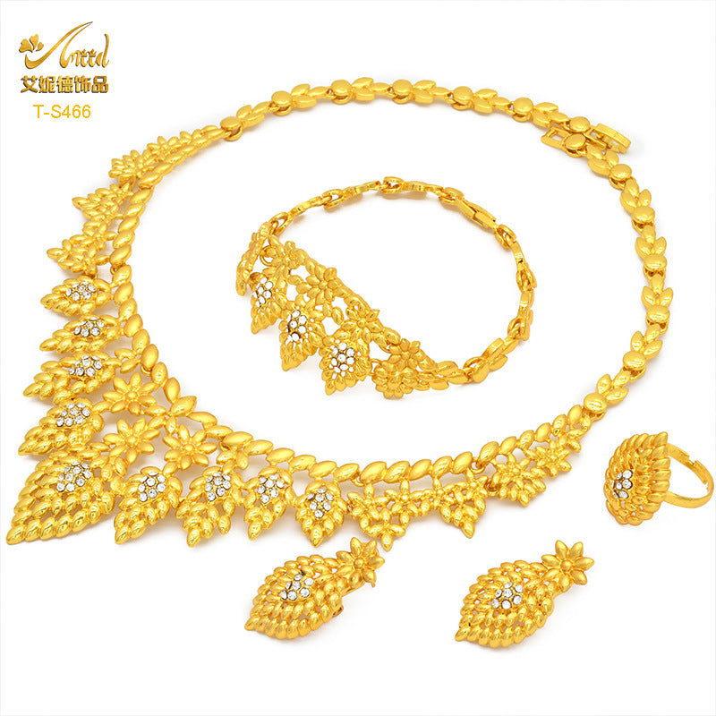 Cross-border hot selling four-piece Indian Dubai gold jewelry necklace bracelet ring earrings bridal wedding big jewelry