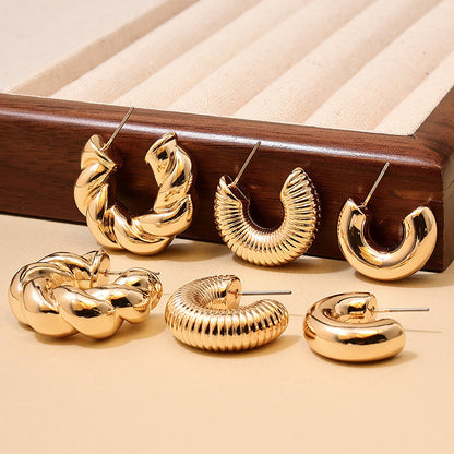 European and American fashion simple twist earrings ladies suit smooth light luxury design sense square face earrings jewelry wholesale