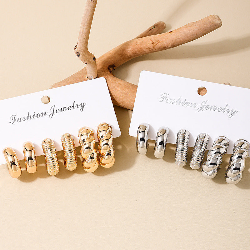 European and American fashion simple twist earrings ladies suit smooth light luxury design sense square face earrings jewelry wholesale