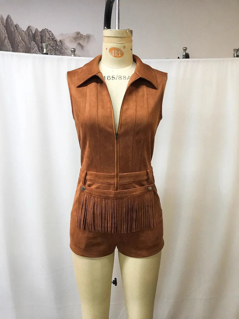 Jumpsuit Women 2026 Spring New Retro Fashion Solid Color Tassel Decor Half Zipper Design Turn-Down Collar Sleeveless Rompers