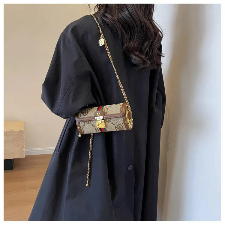 Light luxury brand-name high-end designer bag female 2025 new spring and summer niche shoulder bag messenger bag cylinder bag