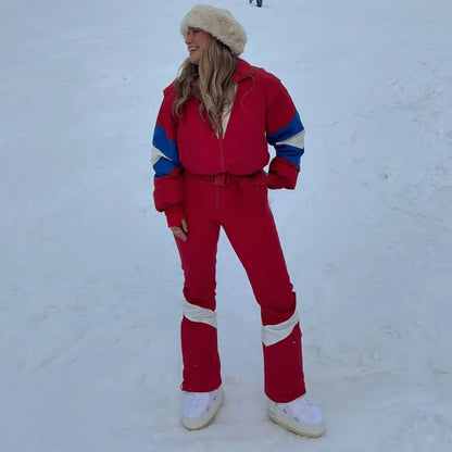 Fashion Pink Faux Fur Patchwork Hood Ski Jumpsuit Women Stand Collar Zipper Slim Pocket One Piece Suit 2026 Winter Lady Skiwears