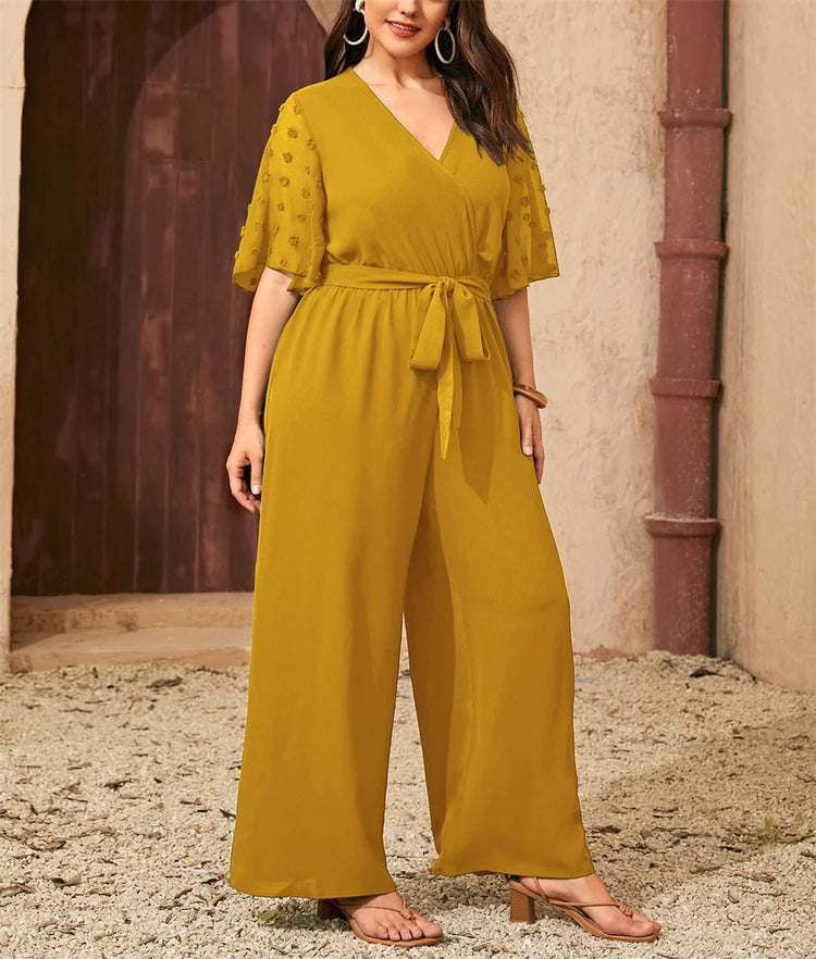 GIBSIE Plus Size Swiss Dot Flounce Sleeve Belted Jumpsuit Women Summer V-neck Elegant Vacation Solid Color Wide Leg Jumpsuits