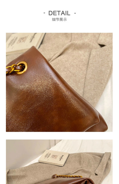 High-quality designer large-capacity underarm tote bag female 2026 new wild light luxury high-end commuter chain messenger bag