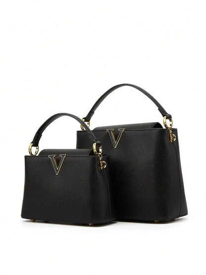 A fashionable crossbody bag with detachable shoulder straps and pebble-patterned leather for ladies