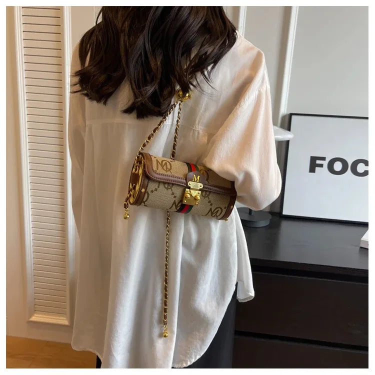 Light luxury brand-name high-end designer bag female 2025 new spring and summer niche shoulder bag messenger bag cylinder bag
