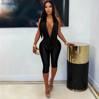 Solid color sleeveless hanging neck, backless strap, slim fit seven inch long jumpsuit