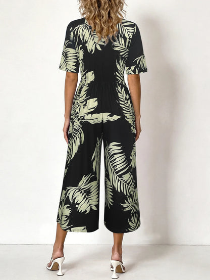 Women's Tropical Leaf Print Short Sleeve Jumpsuit, Summer Casual V Neck Elastic Waist Wide Leg Romper With Side Pockets