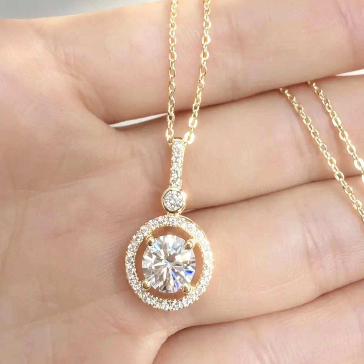 A vintage bohemian-style women's necklace featuring a 1-carat round moissanite set in 925 sterling silver.