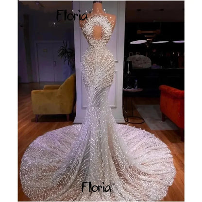 Floria Luxury Sleeveless Wedding Dresses 2026 Pearls Beading Bride Dresses With Long Train Elegant Bridal Gown Customized