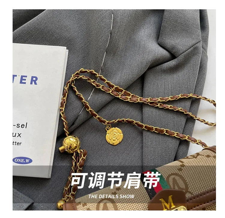 Light luxury brand-name high-end designer bag female 2025 new spring and summer niche shoulder bag messenger bag cylinder bag