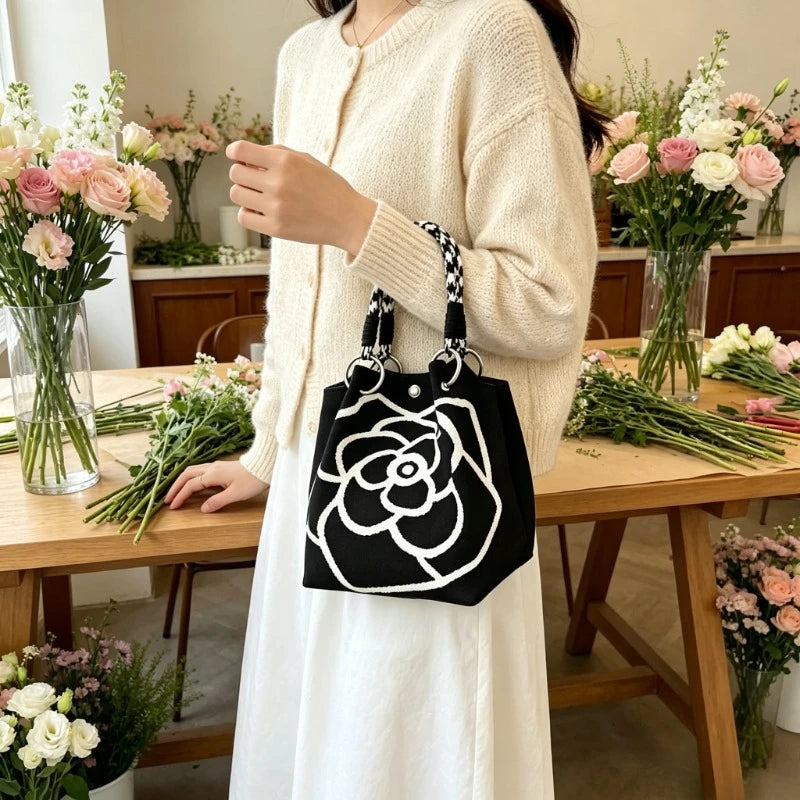 1Pc Women Mini Canvas Handbag with Black Camellia Pattern, Checkered Woven Handle Small Bucket Tote Bag, Fashion Lightweight Portable Top Handle Purse for Daily Shopping Coffee Date Travel