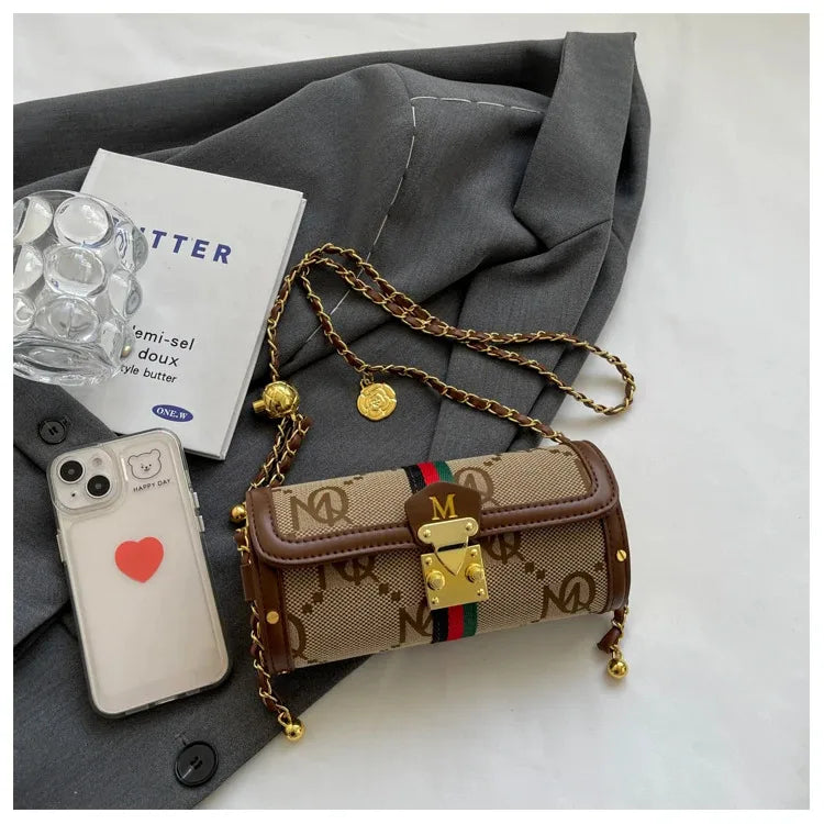 Light luxury brand-name high-end designer bag female 2025 new spring and summer niche shoulder bag messenger bag cylinder bag