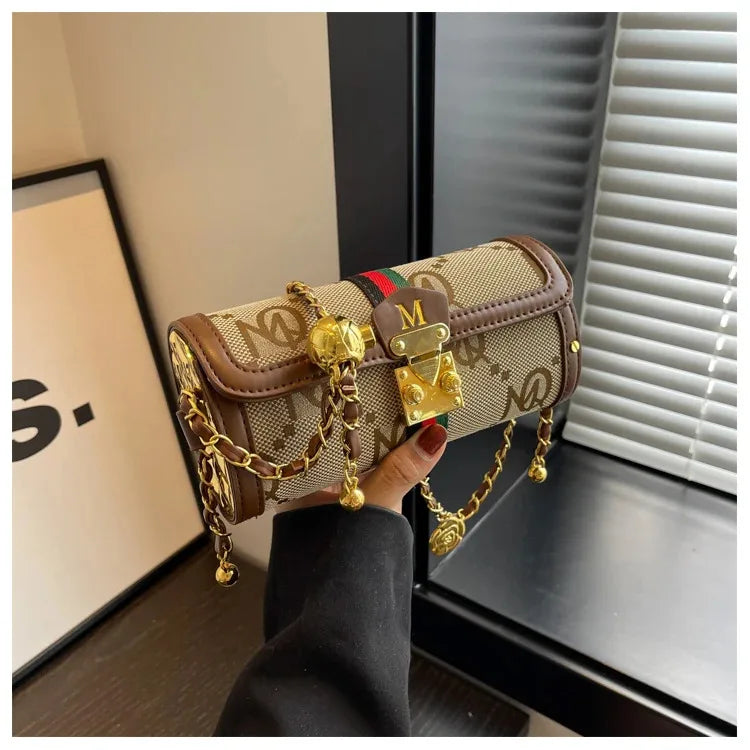 Light luxury brand-name high-end designer bag female 2025 new spring and summer niche shoulder bag messenger bag cylinder bag