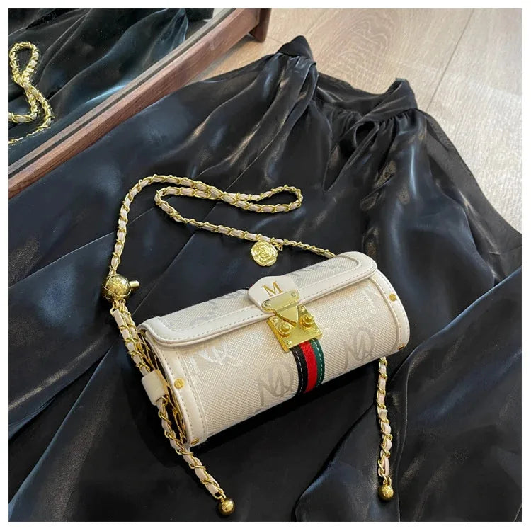 Light luxury brand-name high-end designer bag female 2025 new spring and summer niche shoulder bag messenger bag cylinder bag