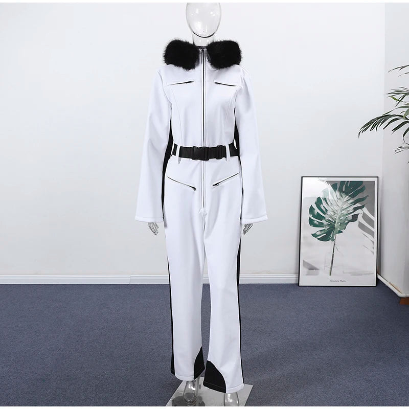Fashion Pink Faux Fur Patchwork Hood Ski Jumpsuit Women Stand Collar Zipper Slim Pocket One Piece Suit 2026 Winter Lady Skiwears