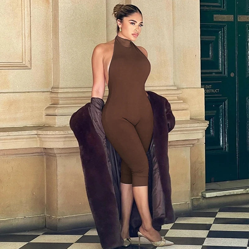 Hugcitar Ribbed Halter Backless Solid Button Sexy Bodycon Skinny Jumpsuit Summer Women Fashion Vacation Romper Streetwear Club
