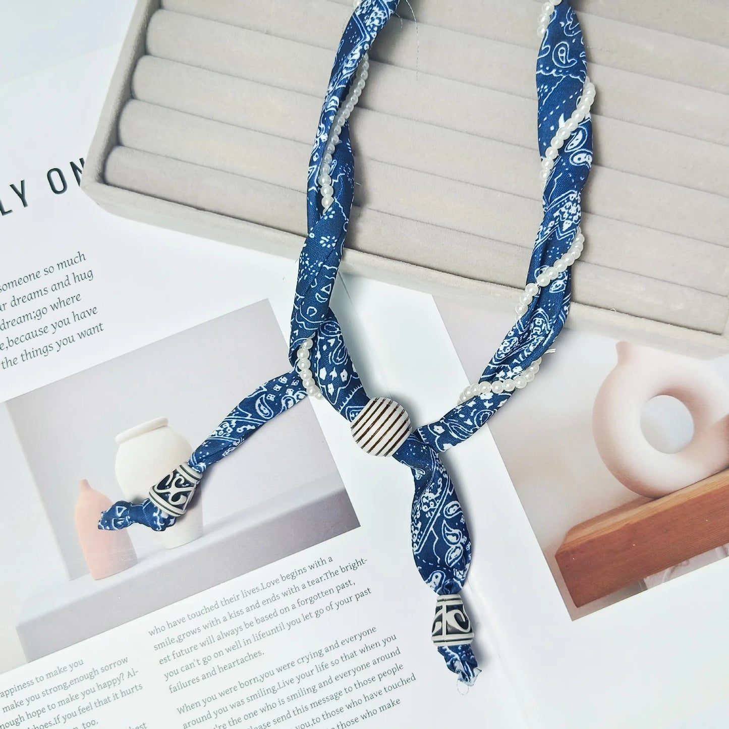 Cashew flower wrapped pearl scarf neck necklace for female artist, unique and beautiful hanging neck accessory, long sweater cha