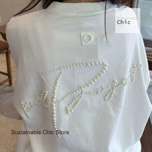 Korean version of fashion stereoscopic Pearl senior loose round neck T-shirt women's summer fashion and leisure niche design top