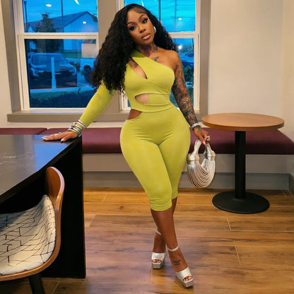 Solid color sexy single shoulder hollow out long sleeved one-piece slim fit pants