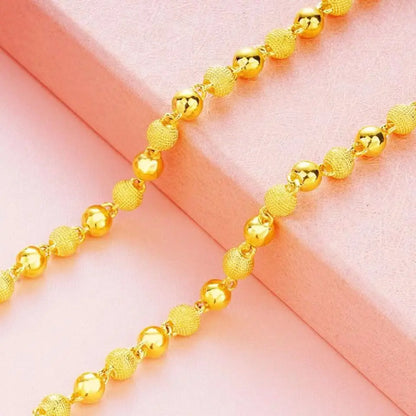 Unisex 24K Gold (AU999) 6mm Matte Sandblasted Bead Necklace | Liquid metal beads, gold-inlaid clasp with minimalist symbols