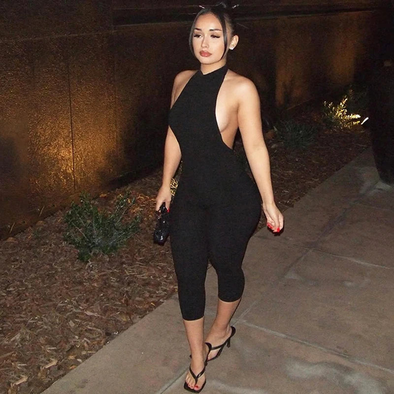 Hugcitar Ribbed Halter Backless Solid Button Sexy Bodycon Skinny Jumpsuit Summer Women Fashion Vacation Romper Streetwear Club