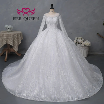 Customized Sheer Neck Long Sleeves Wedding Dress 2026 New Fashion Pearls And Crystal Beaded Luxury Wedding Dress Bride WX0467