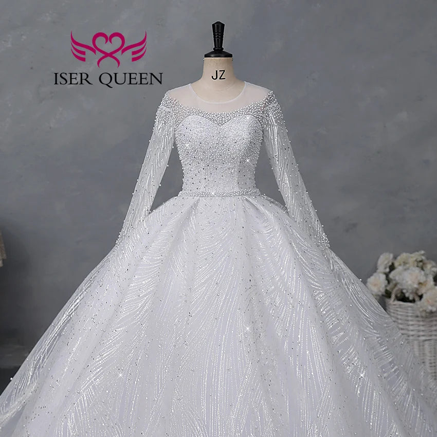 Customized Sheer Neck Long Sleeves Wedding Dress 2026 New Fashion Pearls And Crystal Beaded Luxury Wedding Dress Bride WX0467