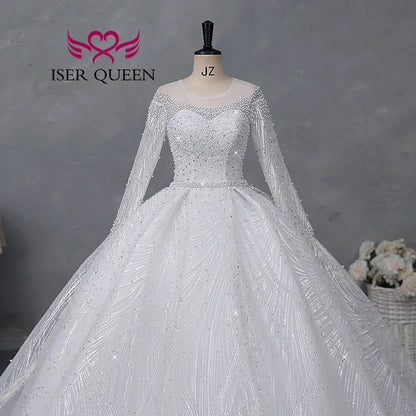 Customized Sheer Neck Long Sleeves Wedding Dress 2026 New Fashion Pearls And Crystal Beaded Luxury Wedding Dress Bride WX0467