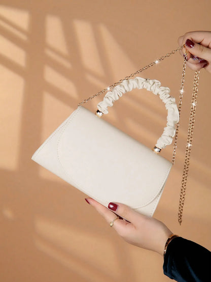 Elegant light luxury solid color women's handbag, fashionable and romantic banquet clutch, suitable for women's daily use.