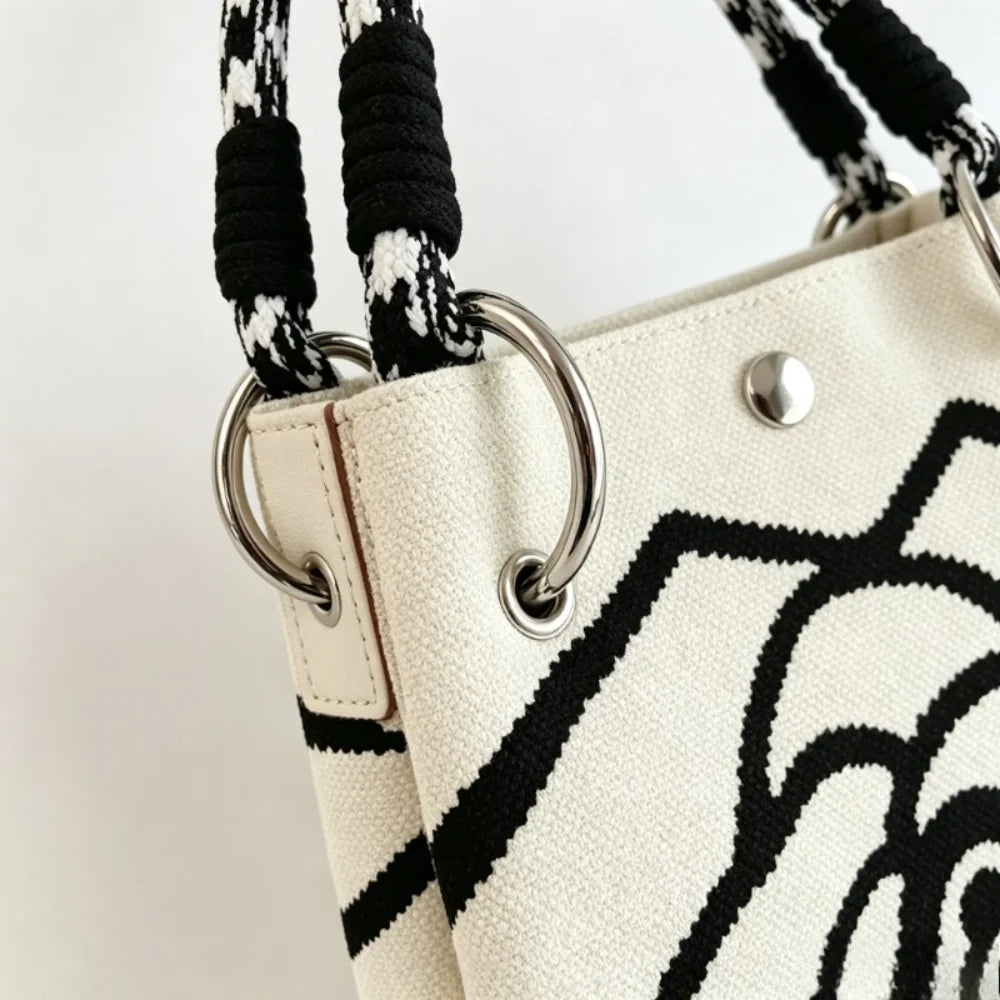 1Pc Women Mini Canvas Handbag with Black Camellia Pattern, Checkered Woven Handle Small Bucket Tote Bag, Fashion Lightweight Portable Top Handle Purse for Daily Shopping Coffee Date Travel