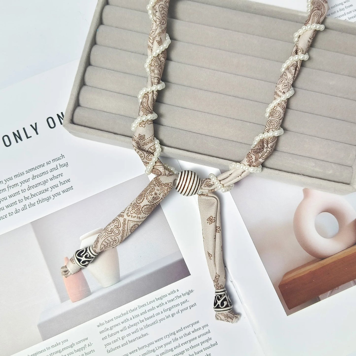 Cashew flower wrapped pearl scarf neck necklace for female artist, unique and beautiful hanging neck accessory, long sweater cha