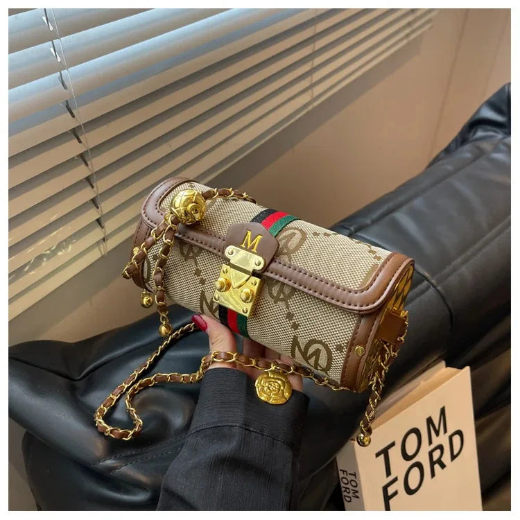Light luxury brand-name high-end designer bag female 2025 new spring and summer niche shoulder bag messenger bag cylinder bag