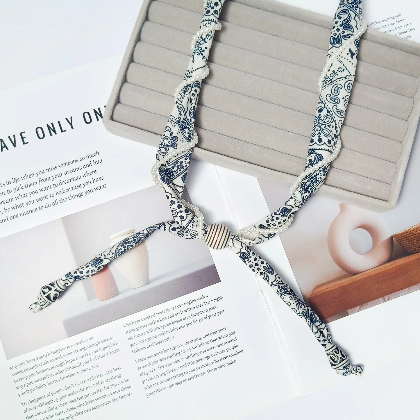 Cashew flower wrapped pearl scarf neck necklace for female artist, unique and beautiful hanging neck accessory, long sweater cha