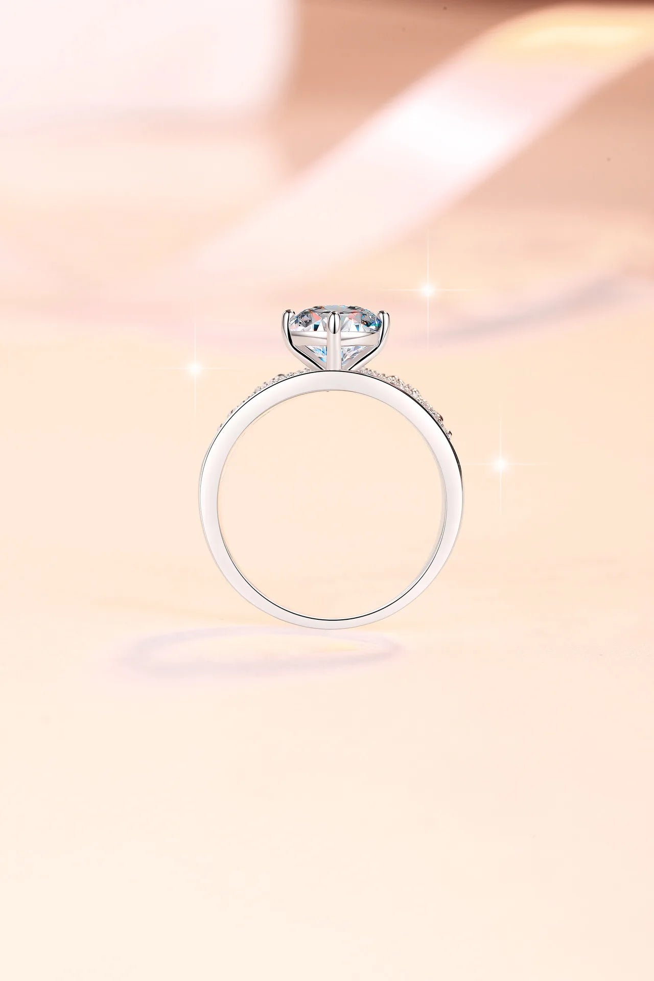 Pure hypoallergenic substrate encases 2ct moissanite for women’s four-prong crown luxury ring with soft PT950 platinum sheets
