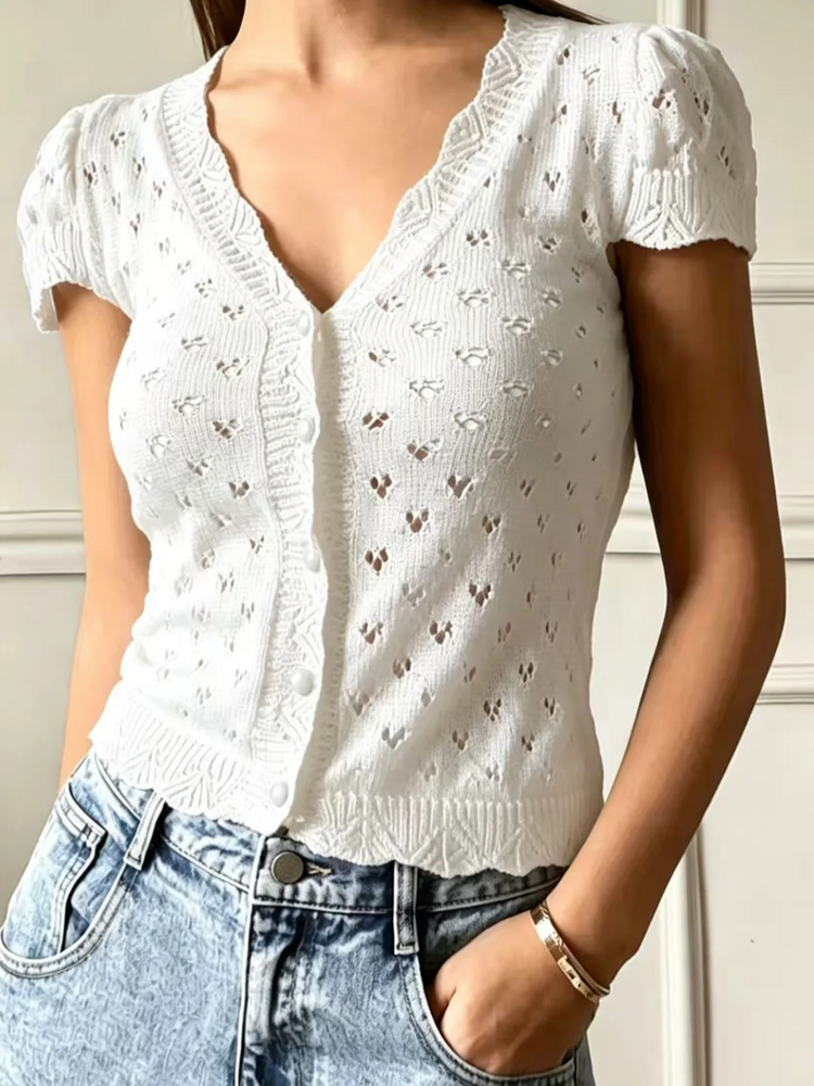 V-neck hollow-out short-sleeved knitted cardigan with single-breasted design, featuring a French vintage and gentle style short
