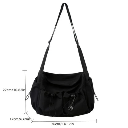 Fashionable Crossbody Bag with Drawstring Accent - Spacious & Secure Zipper Closure - Includes Stylish Bag Charm