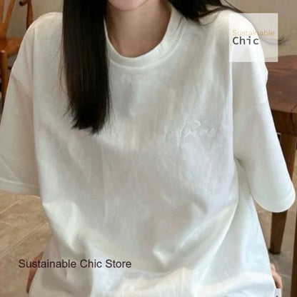Korean version of fashion stereoscopic Pearl senior loose round neck T-shirt women's summer fashion and leisure niche design top