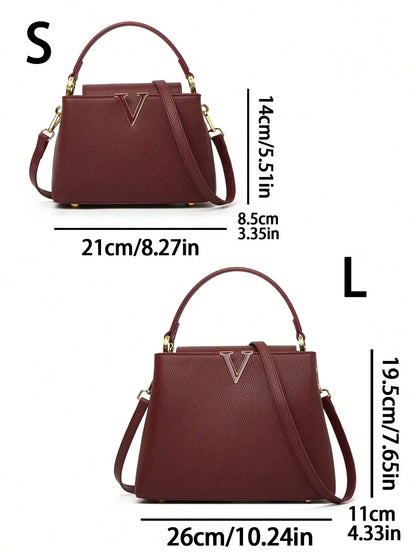 A fashionable crossbody bag with detachable shoulder straps and pebble-patterned leather for ladies