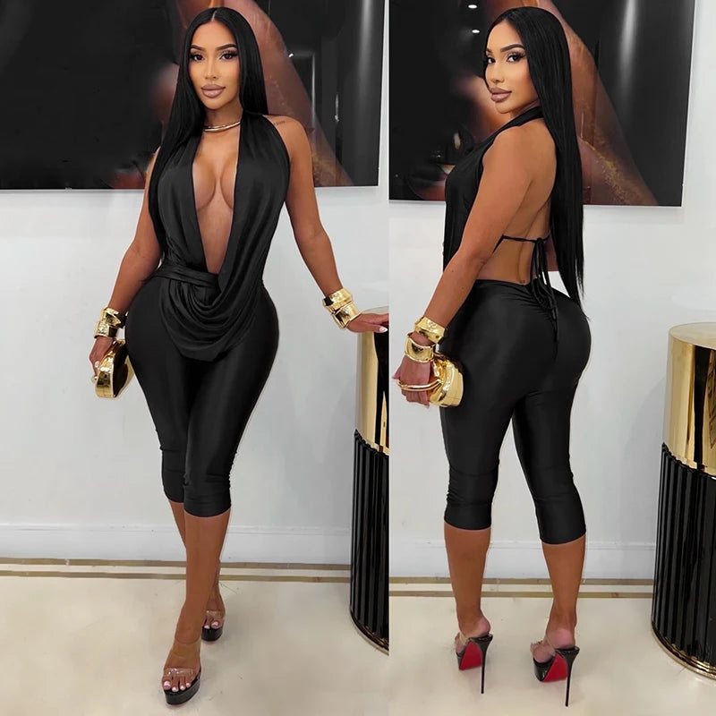 Solid color sleeveless hanging neck, backless strap, slim fit seven inch long jumpsuit
