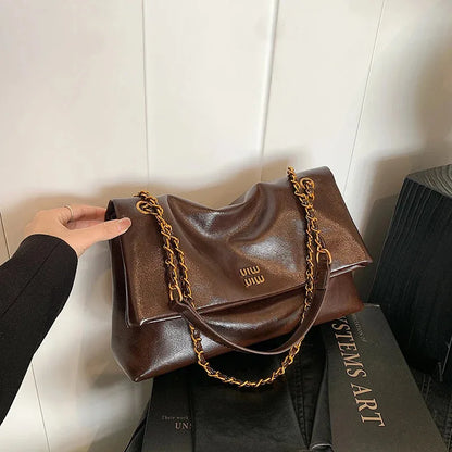 High-quality designer large-capacity underarm tote bag female 2026 new wild light luxury high-end commuter chain messenger bag