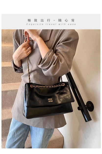 High-quality designer large-capacity underarm tote bag female 2026 new wild light luxury high-end commuter chain messenger bag