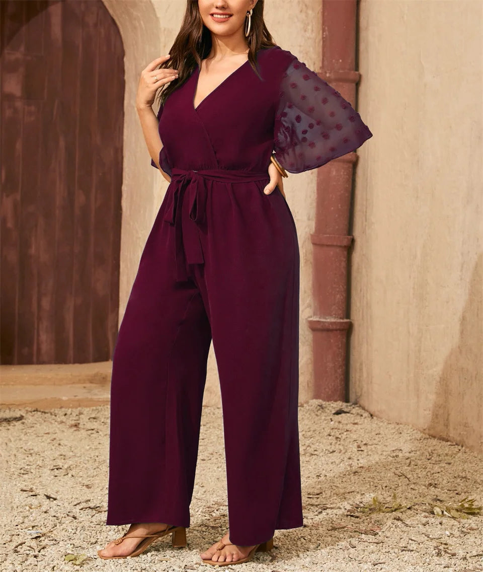 GIBSIE Plus Size Swiss Dot Flounce Sleeve Belted Jumpsuit Women Summer V-neck Elegant Vacation Solid Color Wide Leg Jumpsuits
