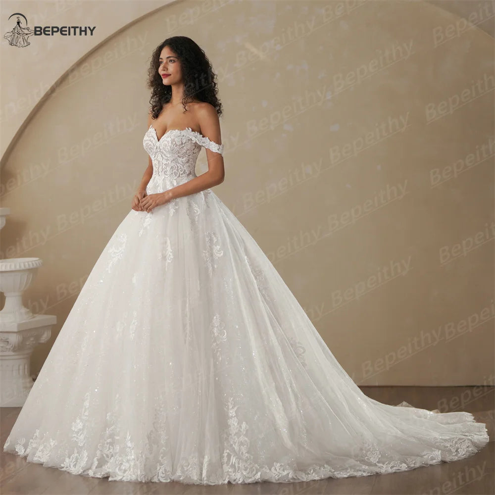 BEPEITHY Customized Princess Off Shoulder Sleeveless Ball Bride Wedding Dresses For Women 2025 Ivory Lace Glitter Bridal Gown