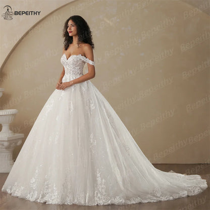 BEPEITHY Customized Princess Off Shoulder Sleeveless Ball Bride Wedding Dresses For Women 2025 Ivory Lace Glitter Bridal Gown